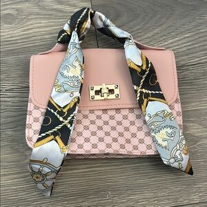 Elegant Pink Handbag with Scarf Detail